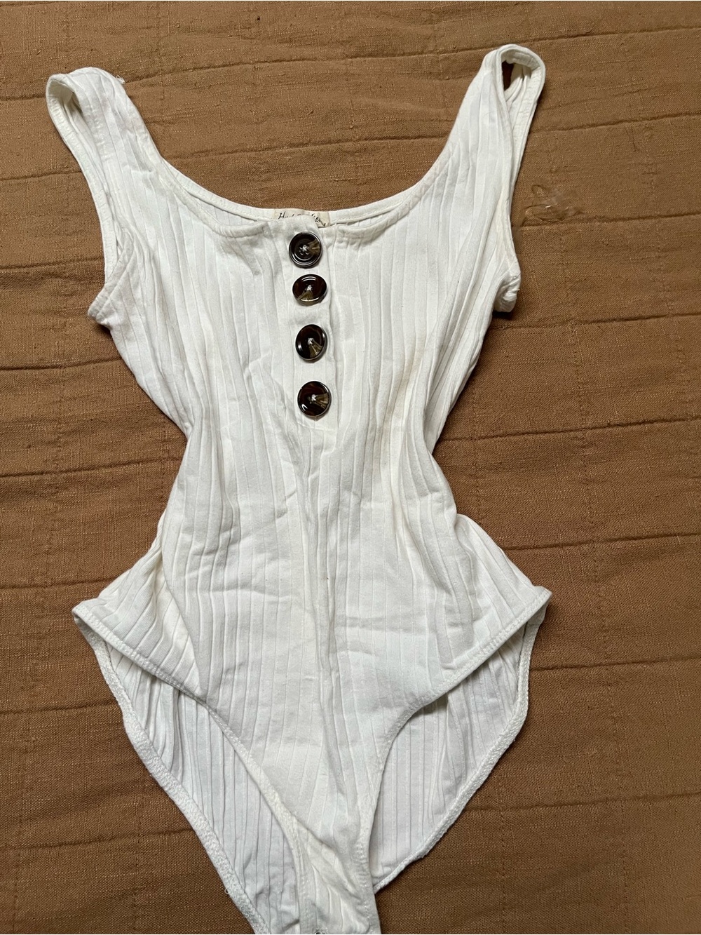 Heart Hips White Ribbed One-Piece with Tortoiseshell Buttons